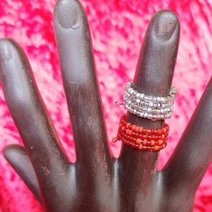 Adjustable,stackable beaded rings.